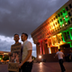 Stephen Flowers (L) and Nick Bazo, hold a photo of their friends Drew Leinonen and Juan Guerrero, both killed in the Orlando’s Pulse nightclub attack.